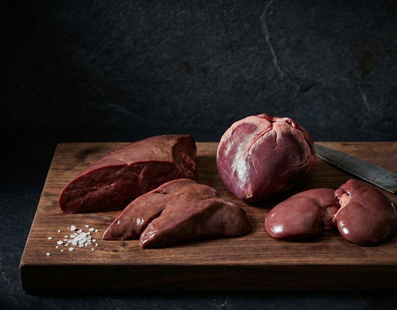 Fresh organ meats on cutting board